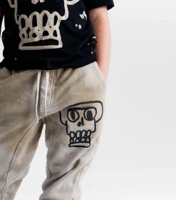 NUNUNU Kooky Skull Sweatpants Flash Sale
